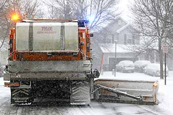 Plymouth snowplow clearing roadways