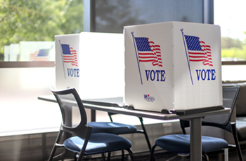 Photo of voting booths at Plymouth City Hall