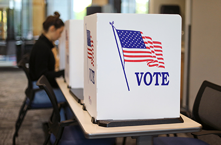 Photo of a voting booth at a table