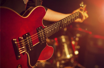 Person playing guitar