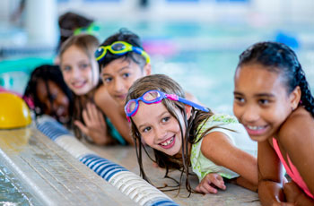 Kids swimming in a pool