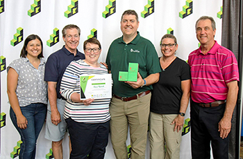 Plymouth city staff and council members accept a certificate from GreenStep Cities recognizing the city’s achievement of Step 2 within the five-step environmental initiative system. 