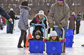 Recycling bin races on the frozen lake at Fire and Ice in Plymouth