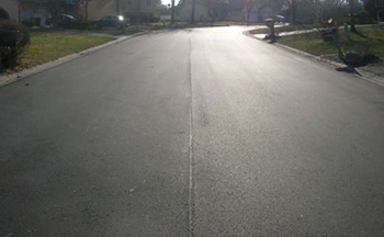 A smooth, freshly paved street