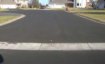 A smooth, freshly paved street