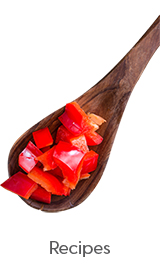 Cut up bell pepper on a spoon