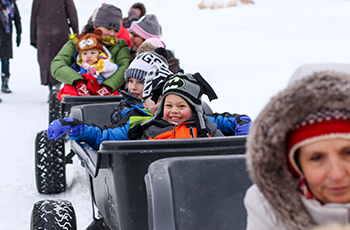 Children enjoying the train ride during Plymouth's Fire and Ice winter festival