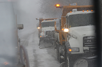 Snow plows clearing streets in Plymouth, MN