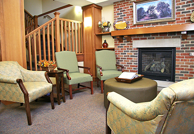 Cozy sitting area by a fireplace