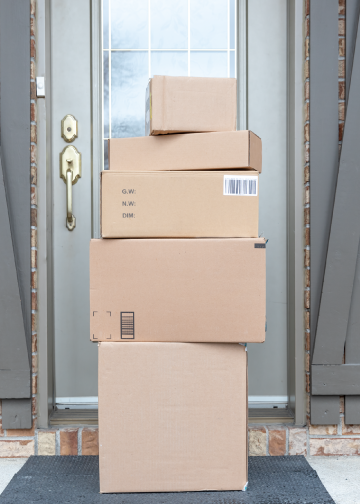 Stack of packages at a front door